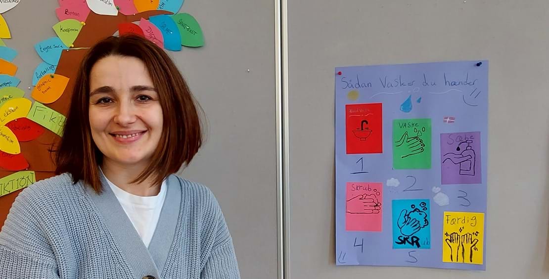 Maryna Zhuk ser smilende ind i kameraet.