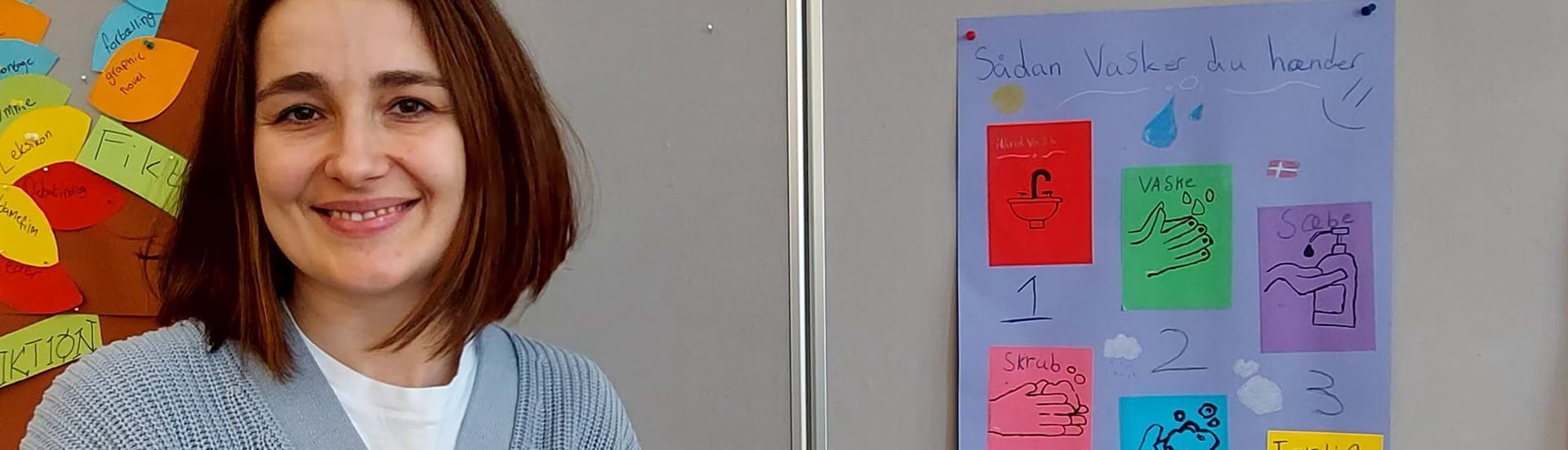Maryna Zhuk ser smilende ind i kameraet.
