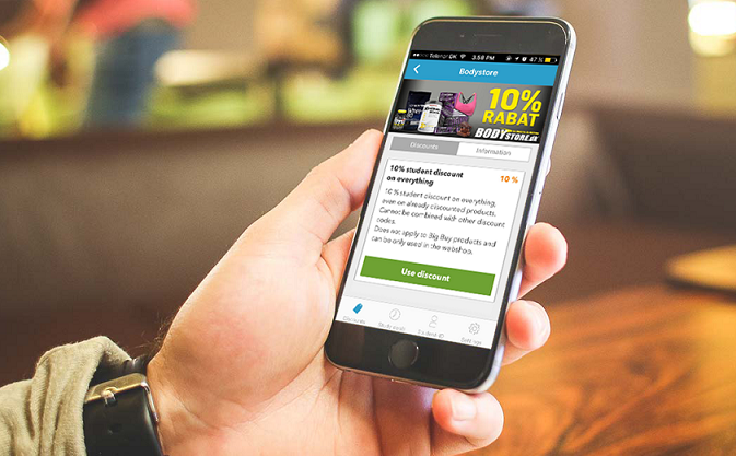 En smartphone vises hvor der på skærmen er et tilbud i Studiz-app'en.