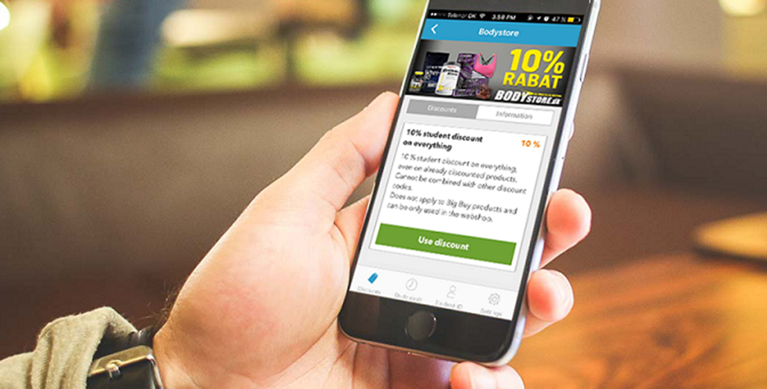 En smartphone vises hvor der på skærmen er et tilbud i Studiz-app'en.